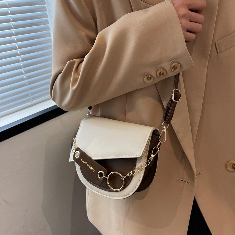 Multi functional Instagram Crossbody 2024 new designer bag fashion avant-garde contrasting color saddle women's shoulder bag