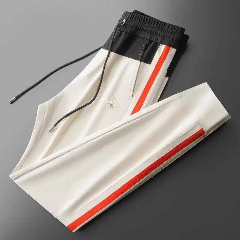 Luxury brand mens long pants with bee embroidery 2024 new spliced sports pants summer lightweight and trendy golf pantsX241008