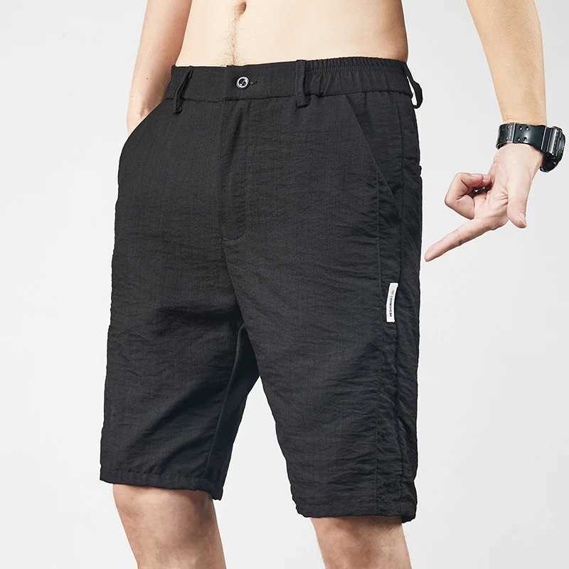 Summer thin ice silk casual shorts solid color mens lightweight elastic straight beach casual shorts mens sports loose shortsW240713