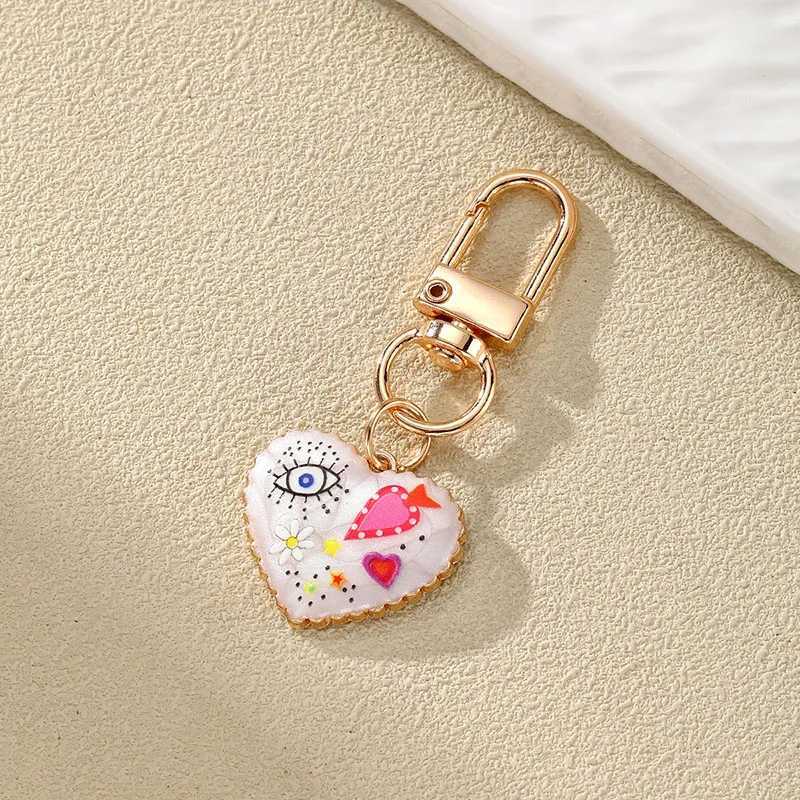 Personality Ethnic Eyes Heart Keychain for Women Fashion Printed Drop Oil Flower Key Buckle Handbag Earphone Case DecorationX241008