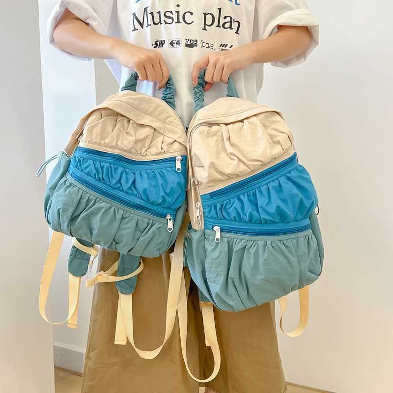women's summer backpack with Korean style nylon fabric, large capacity casual pleated splicing design, contrasting color backpack 241015
