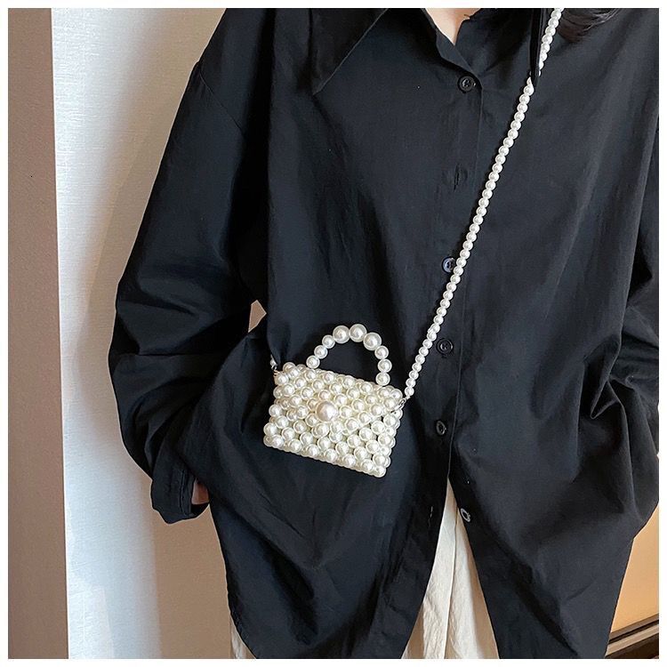 2024 new designer handbag pearl handbag women's niche handmade high-end multifunctional pearl shoulder chain small bag ins crossbody bag