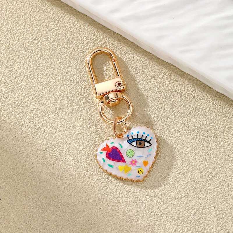 Personality Ethnic Eyes Heart Keychain for Women Fashion Printed Drop Oil Flower Key Buckle Handbag Earphone Case DecorationX241008