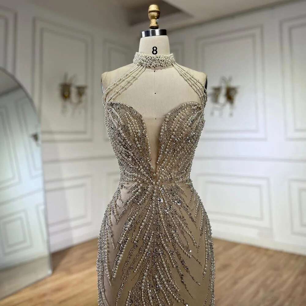 Wasisi 2024 Arabic Nude Halter Neck Mermaid Pearls Beaded Dubai Evening Gown for Women's Party ELA72696