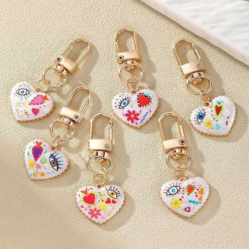 Personality Ethnic Eyes Heart Keychain for Women Fashion Printed Drop Oil Flower Key Buckle Handbag Earphone Case DecorationX241008