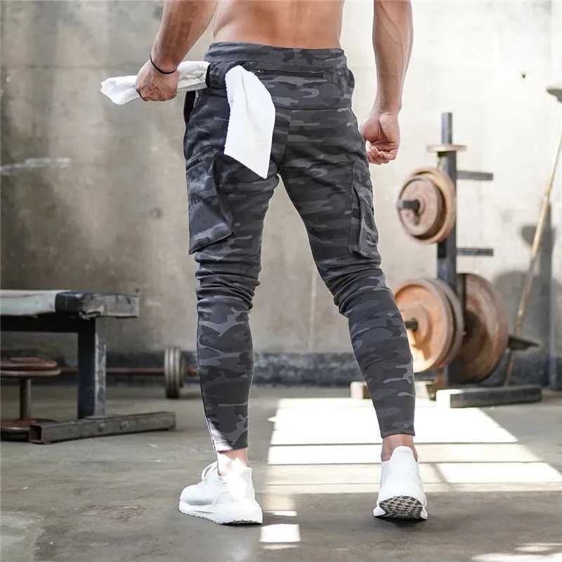 2023 NEW Men pants Sweatpants Man Gyms Workout Fitness Sports Trousers Male Running Skinny Track Pants Training Jogger Pants menX241008