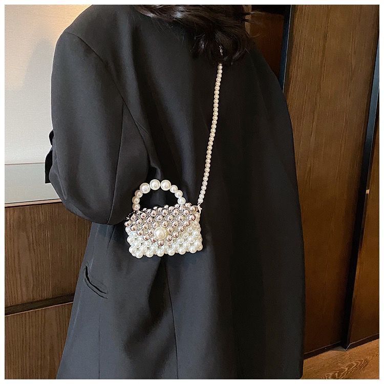 2024 new designer handbag pearl handbag women's niche handmade high-end multifunctional pearl shoulder chain small bag ins crossbody bag