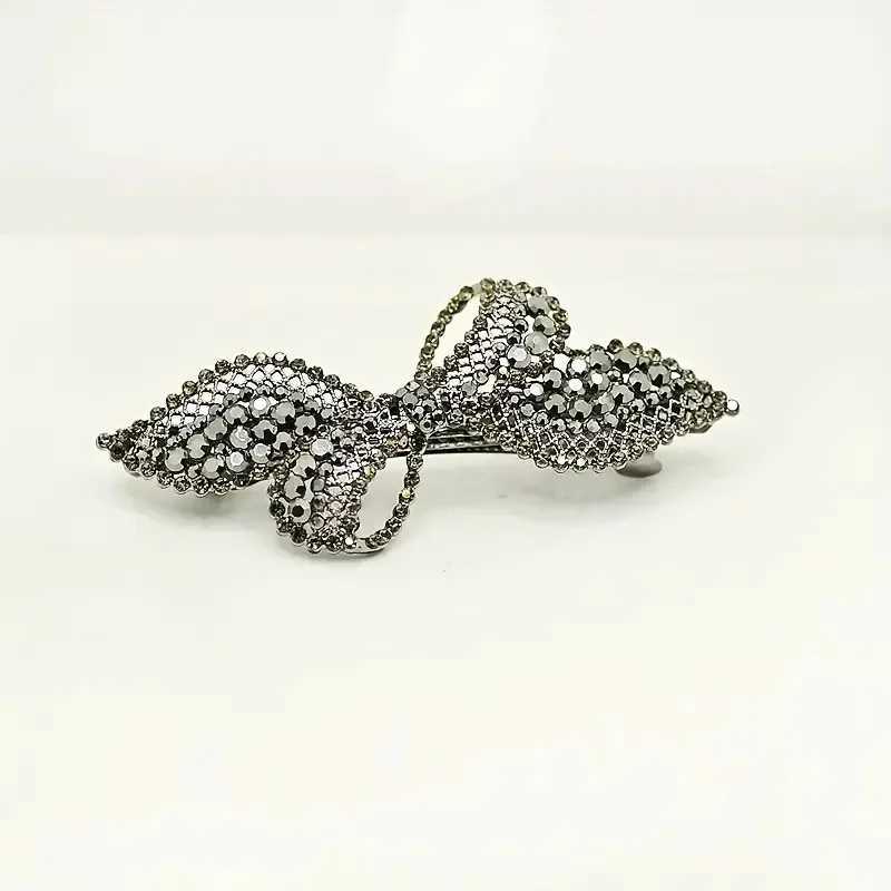 Fashionable and elegant zircon hollow bow womens hair clip retro luxury spring clip wearing mother jewelry gift W241007