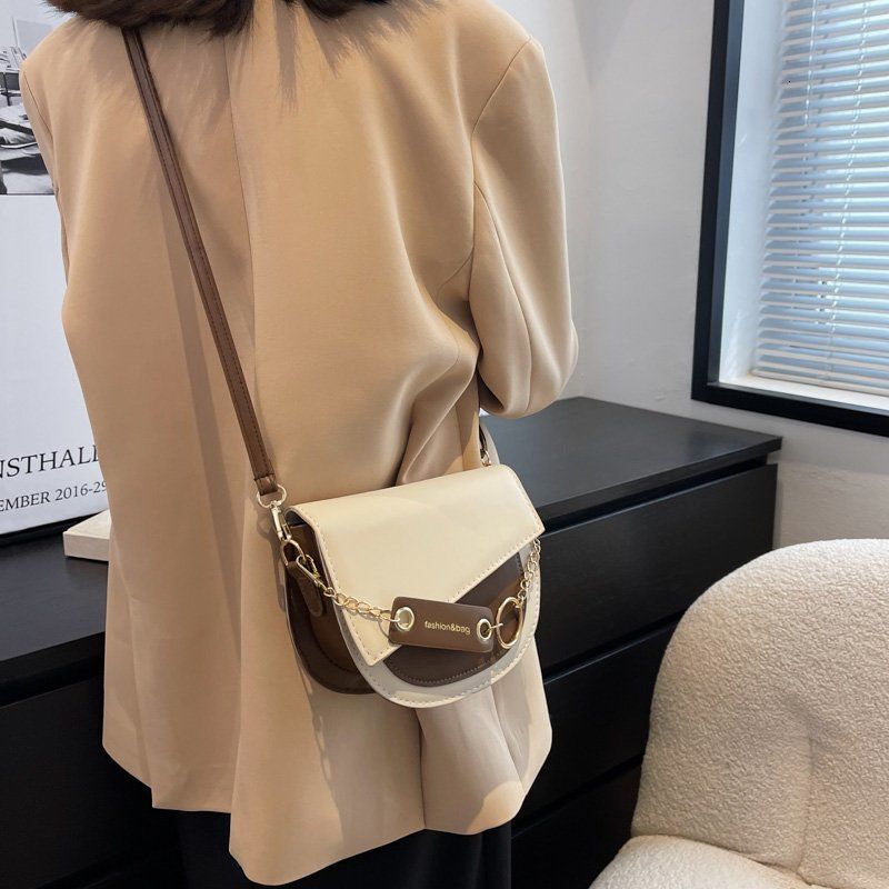 Multi functional Instagram Crossbody 2024 new designer bag fashion avant-garde contrasting color saddle women's shoulder bag