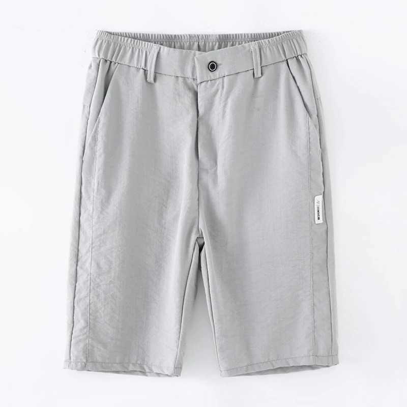 Summer thin ice silk casual shorts solid color mens lightweight elastic straight beach casual shorts mens sports loose shortsW240713