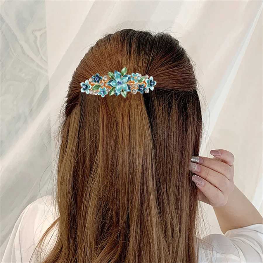 High end Korean butterfly flower spring clip hair clip womens fashion metal drip oil half tie hair clip top hair clip W241007
