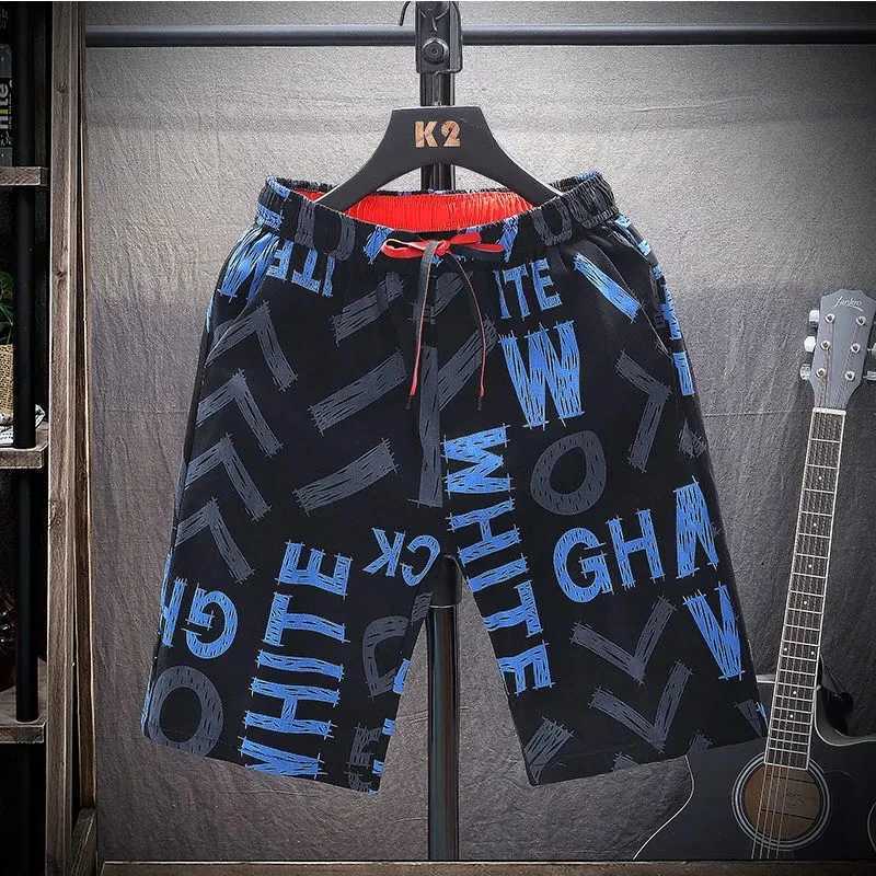 Mens new ice silk shorts summer fashion sports shorts mens casual quick drying beach shorts straight shortsW240713