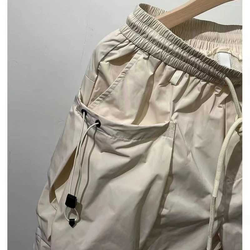 Mens shorts loose fitting Harajuku streetwear multi pocket fashionable outerwear shorts for quick drying outdoor leisure and fitness high-quality shor