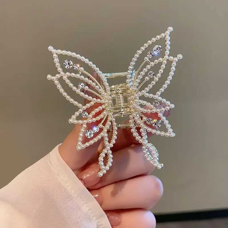 Korean style elegant warm pearl rhinestone high-end womens shark clip metal hollow butterfly grip clip half tied hair W241007