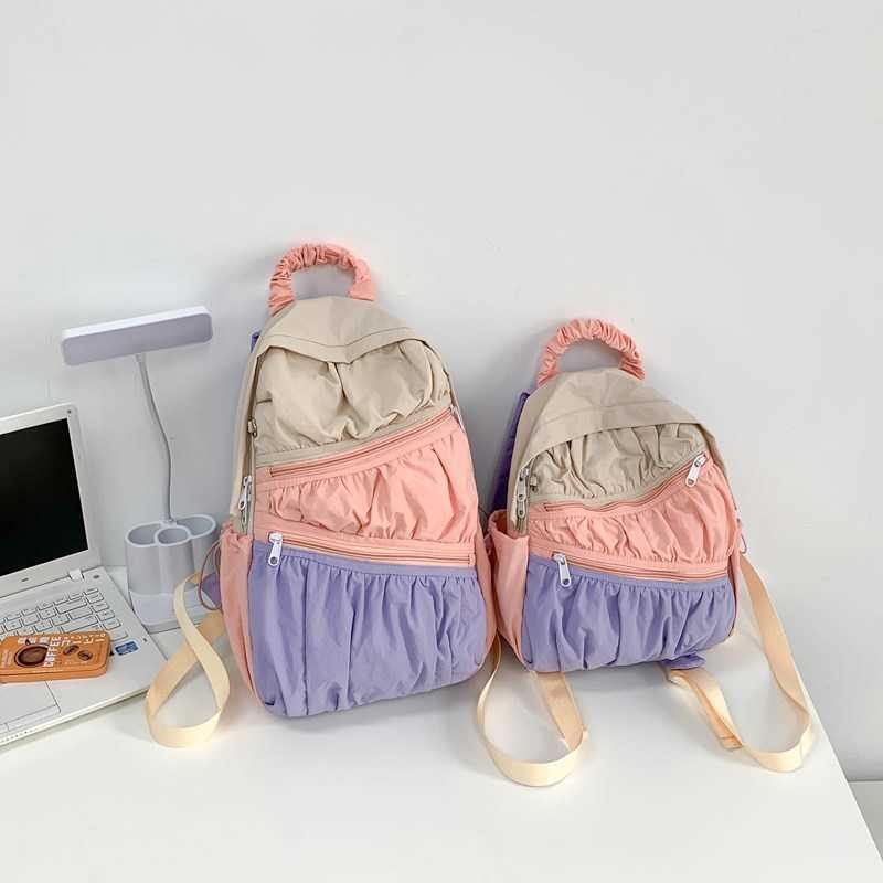 women's summer backpack with Korean style nylon fabric, large capacity casual pleated splicing design, contrasting color backpack 241015