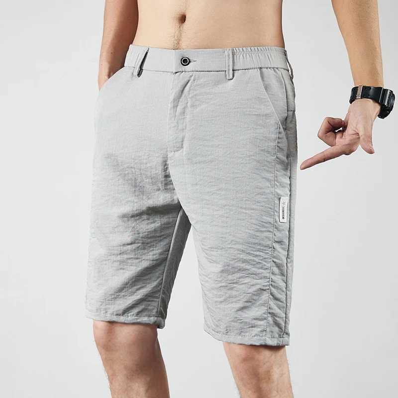 Summer thin ice silk casual shorts solid color mens lightweight elastic straight beach casual shorts mens sports loose shortsW240713