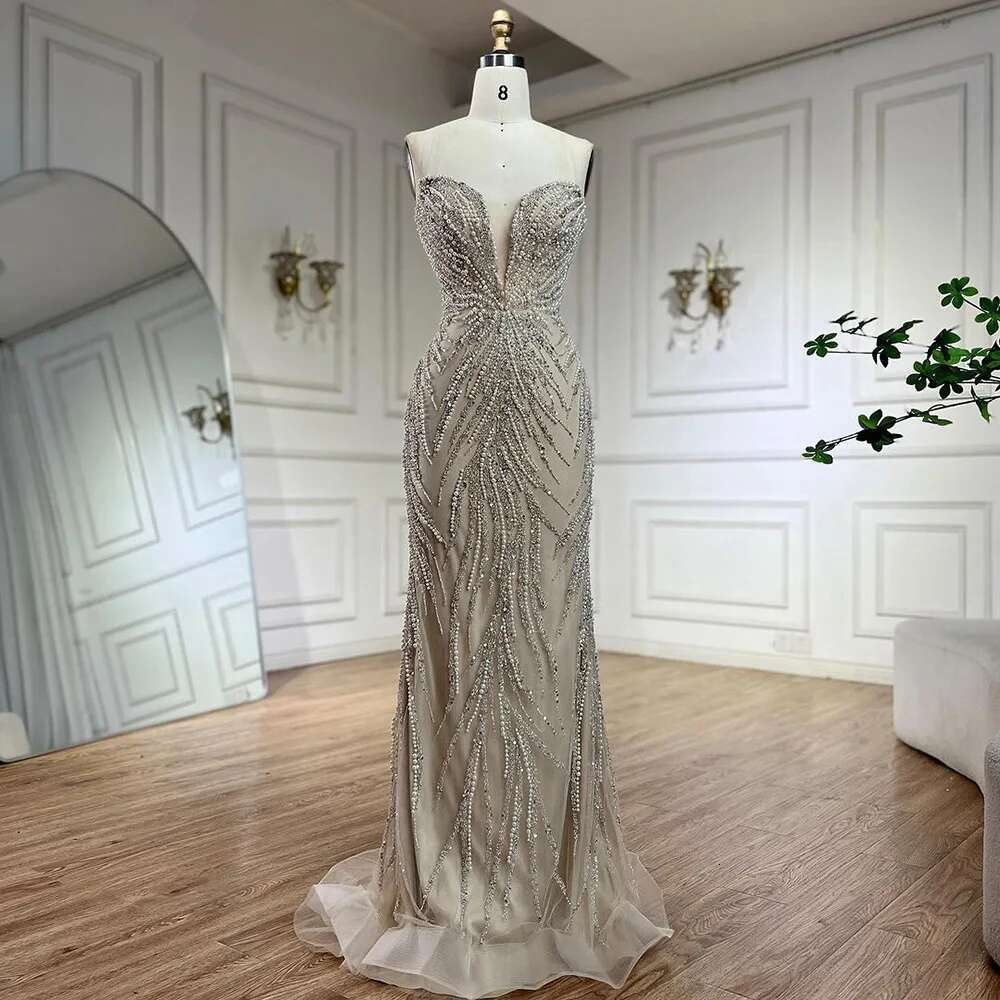 Wasisi 2024 Arabic Nude Halter Neck Mermaid Pearls Beaded Dubai Evening Gown for Women's Party ELA72696