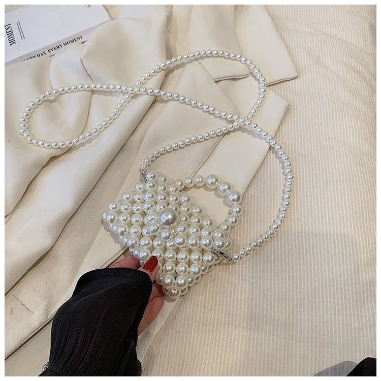 2024 new designer handbag pearl handbag women's niche handmade high-end multifunctional pearl shoulder chain small bag ins crossbody bag