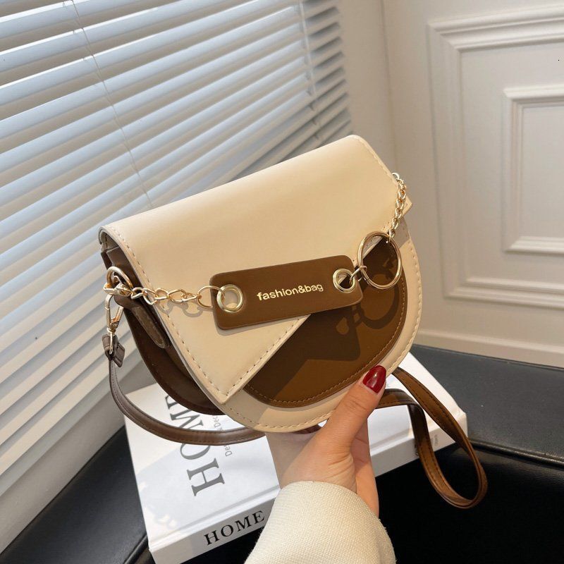 Multi functional Instagram Crossbody 2024 new designer bag fashion avant-garde contrasting color saddle women's shoulder bag