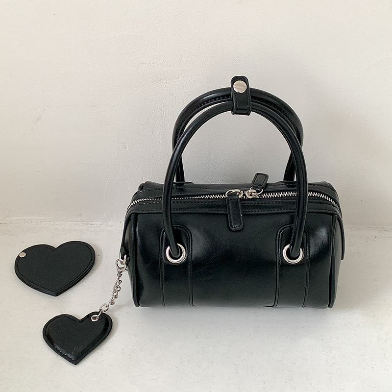 2024 new Korean version summer personalized women's crossbody high-end feeling heart pendant commuting hand-held bowling bag