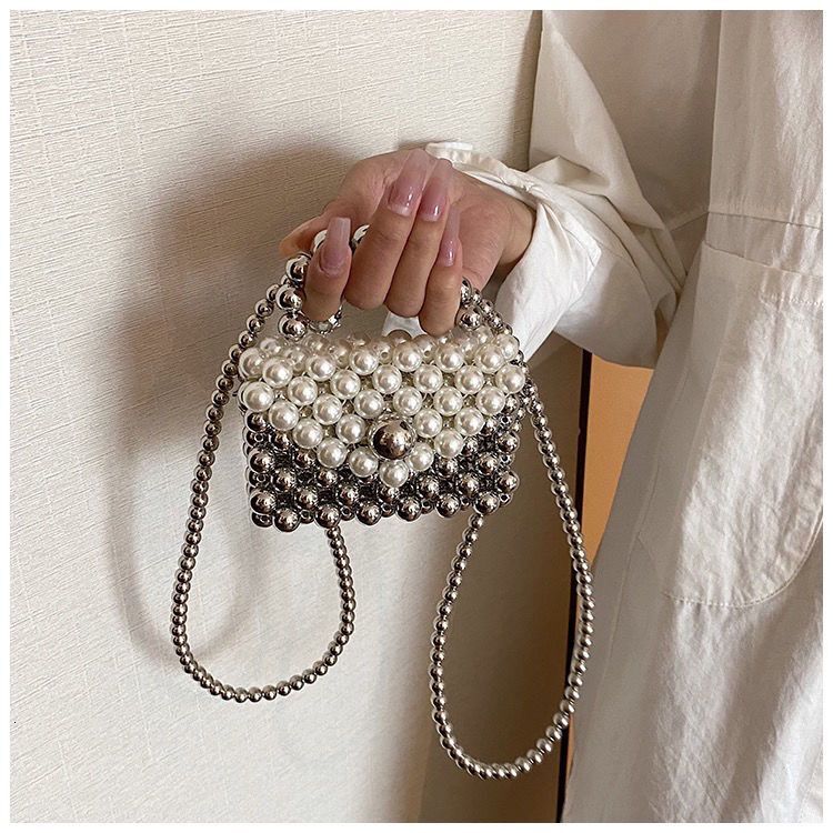 2024 new designer handbag pearl handbag women's niche handmade high-end multifunctional pearl shoulder chain small bag ins crossbody bag