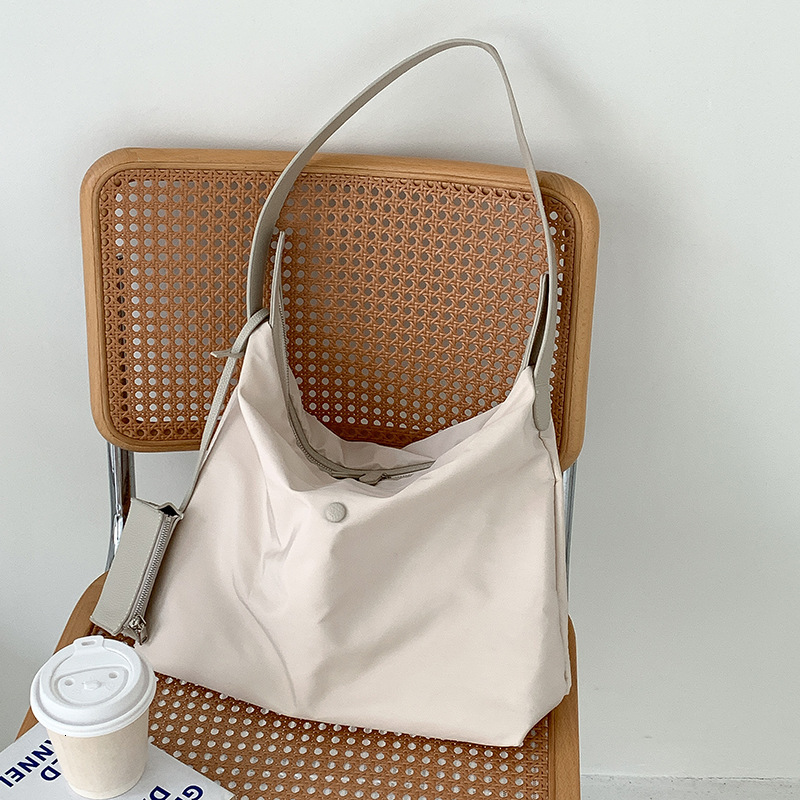 Korean casual nylon shoulder women's large capacity commuting bag, solid color versatile splicing waterproof tote bag