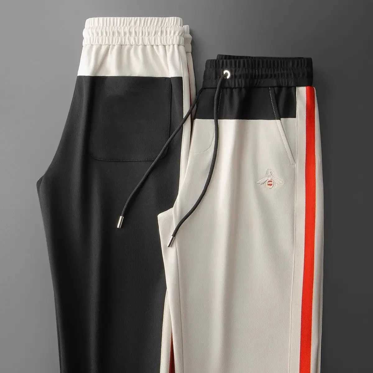 Luxury brand mens long pants with bee embroidery 2024 new spliced sports pants summer lightweight and trendy golf pantsX241008