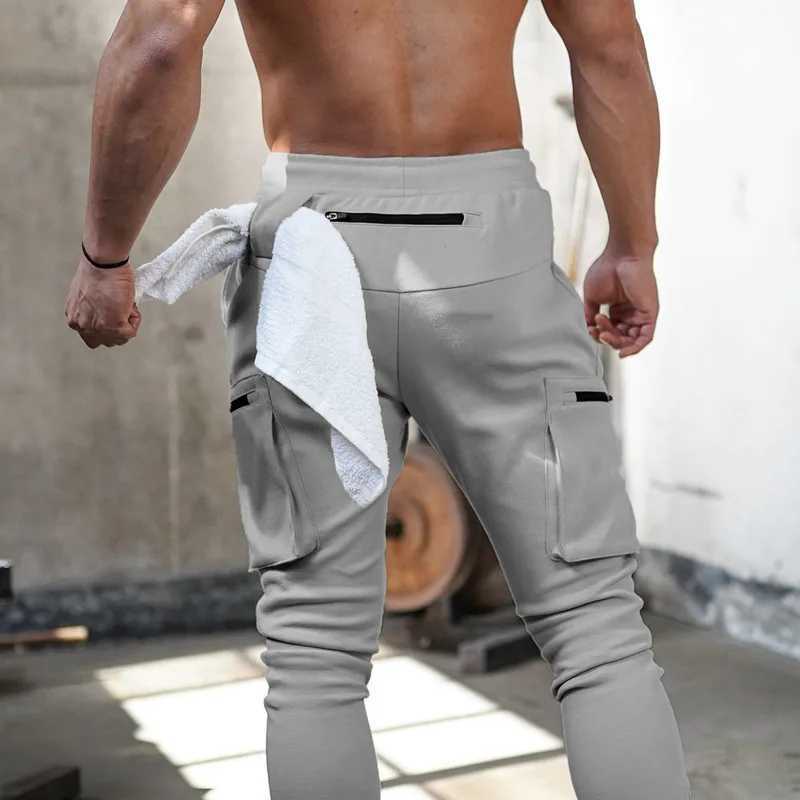 2023 NEW Men pants Sweatpants Man Gyms Workout Fitness Sports Trousers Male Running Skinny Track Pants Training Jogger Pants menX241008