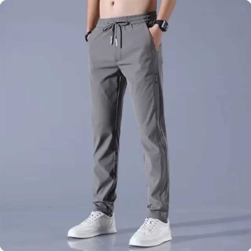 New Spring Summer Mens Casual Pants Slim Pant Straight Thin Trousers Male Fashion Stretch Khaki Jogging M-5XLX241008