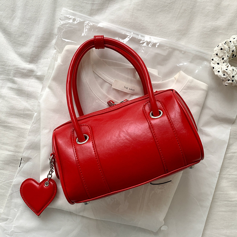2024 new Korean version summer personalized women's crossbody high-end feeling heart pendant commuting hand-held bowling bag