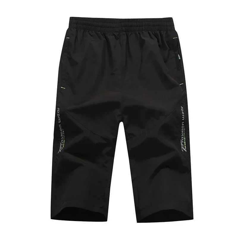 Long sleeved mens board quick drying zipper pocket elastic Bermuda mens thin lightweight elastic Capri elastic mens summer shortsW240713