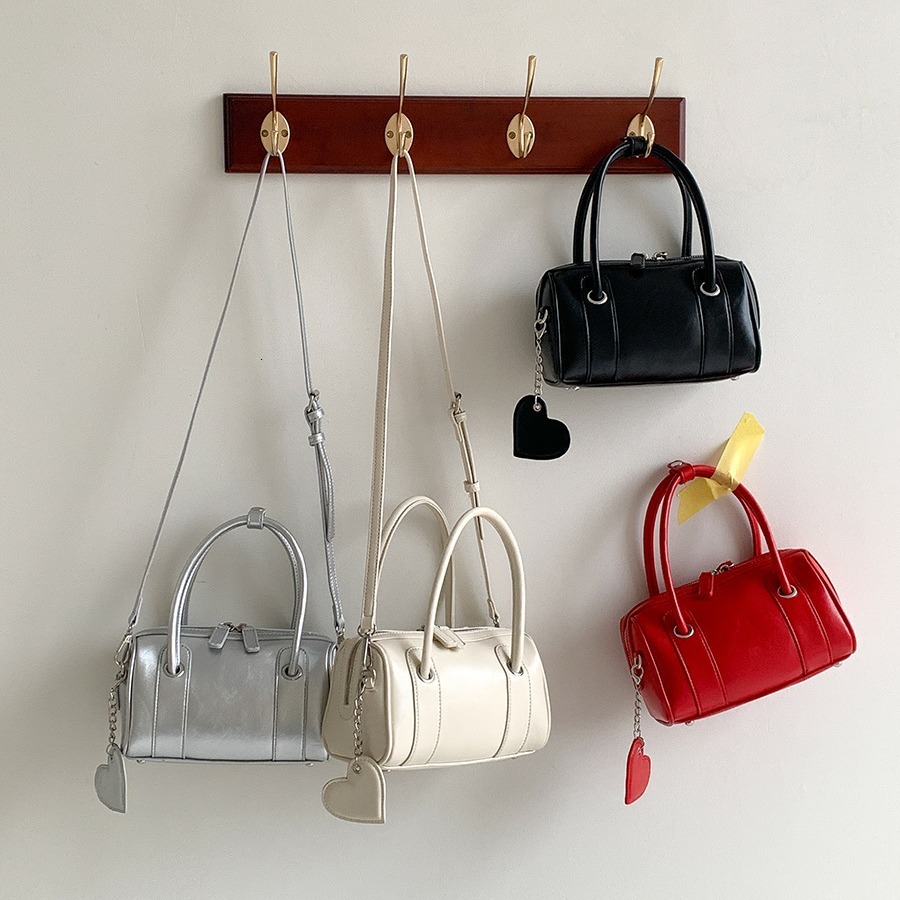 2024 new Korean version summer personalized women's crossbody high-end feeling heart pendant commuting hand-held bowling bag