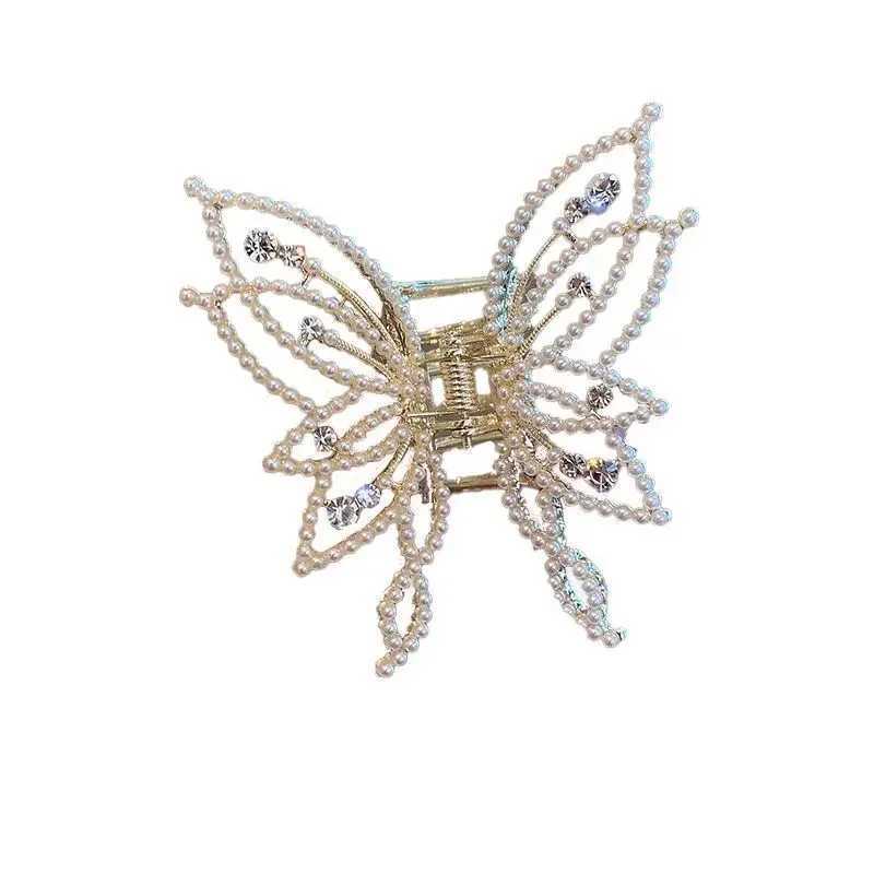 Korean style elegant warm pearl rhinestone high-end womens shark clip metal hollow butterfly grip clip half tied hair W241007