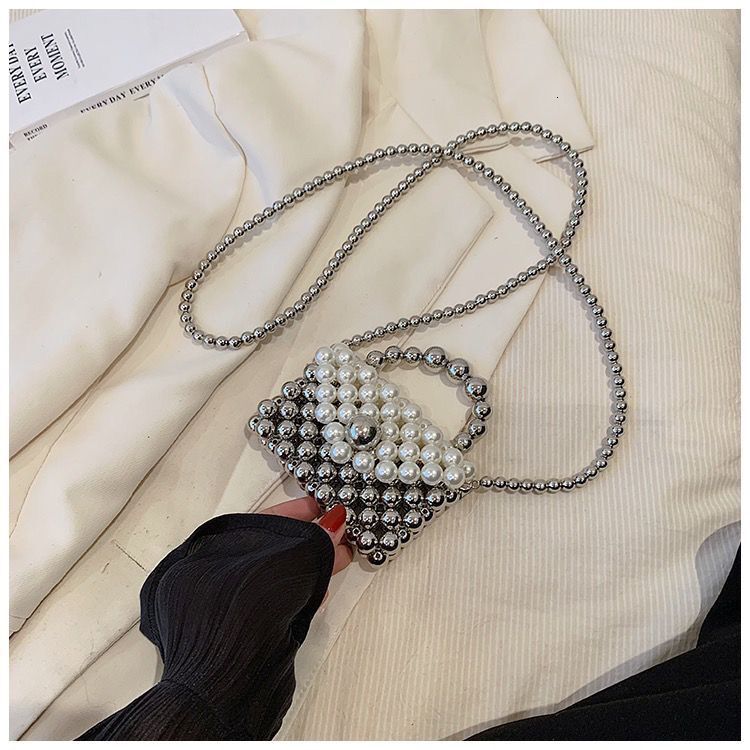 2024 new designer handbag pearl handbag women's niche handmade high-end multifunctional pearl shoulder chain small bag ins crossbody bag