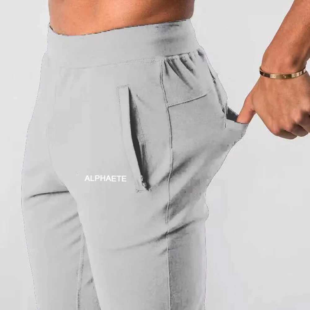 2023 New Muscle Fitness Running Training Sports Cotton Trousers Mens Breathable Slim Beam Mouth Casual Health PantsX241008