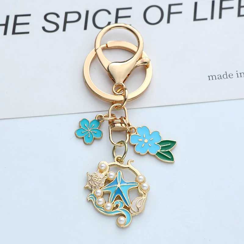 Ocean Style Drop Oil Shell Starfish Cherry Blossoms Keychain Fashion Creative Gold Color Metal Keychain Bag Car Key DecorationX241008