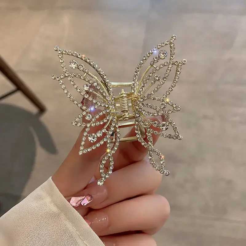 Korean style elegant warm pearl rhinestone high-end womens shark clip metal hollow butterfly grip clip half tied hair W241007