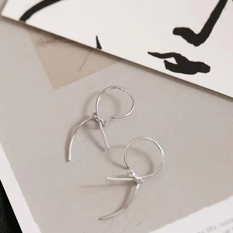 Pure sier needle knotted ribbon trendy women's ear accessories, simple and cool style earrings, earrings