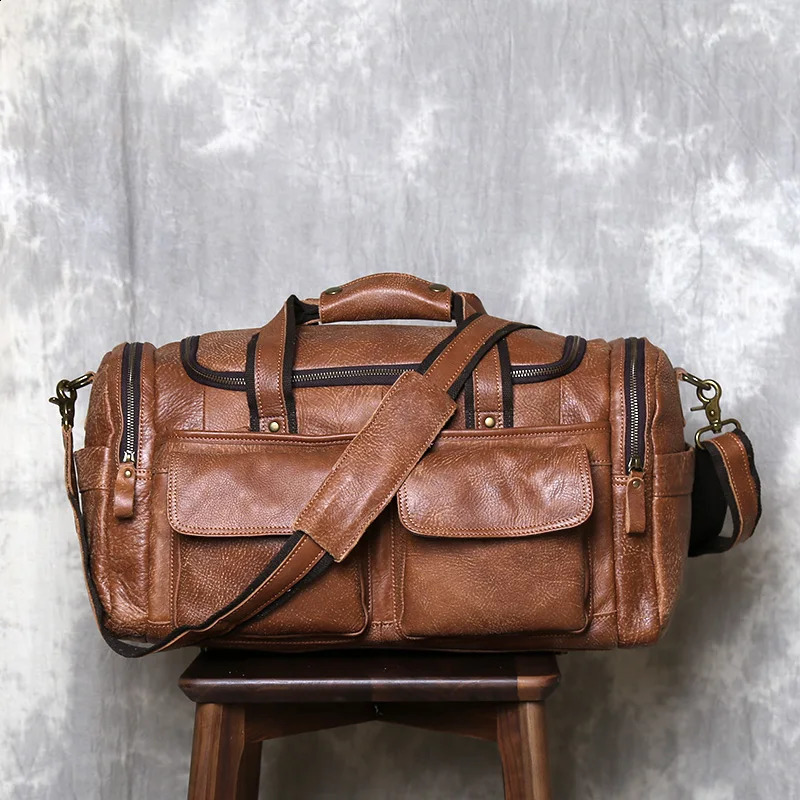 Retro large capacity mens top denim travel bag leather cross body bag handheld short distance luggage bag 240925