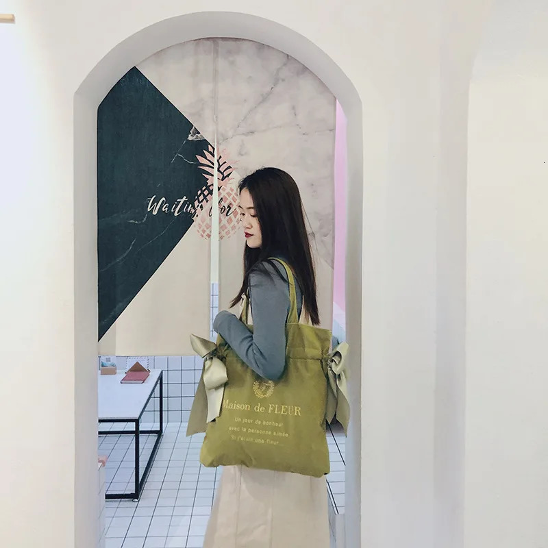 Womens canvas shoulder bag Korean version cute bow handbag student fashion large capacity reusable school shopping bag 241008