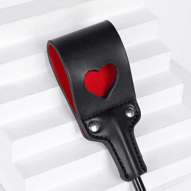A hair replacement sex toy SM prop hollow heart sex racket SP long pole sex leather racket adult product