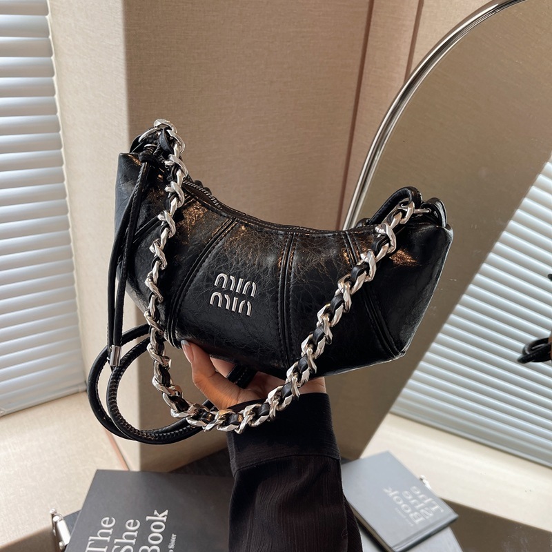 designer winter croissant cross body women's 2024 new niche fashion single shoulder handbag