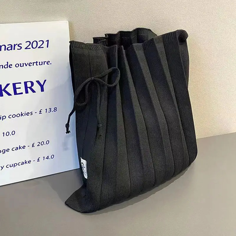 Korean niche pleated shoulder bag shopping bag spring/summer folding knitted large portable womens organ bag 241008