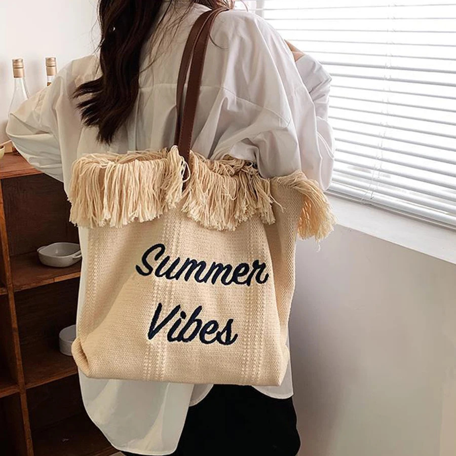 Fashionable large capacity letter embroidered edge canvas handbag portable commuting and shopping shoulder bag 241008