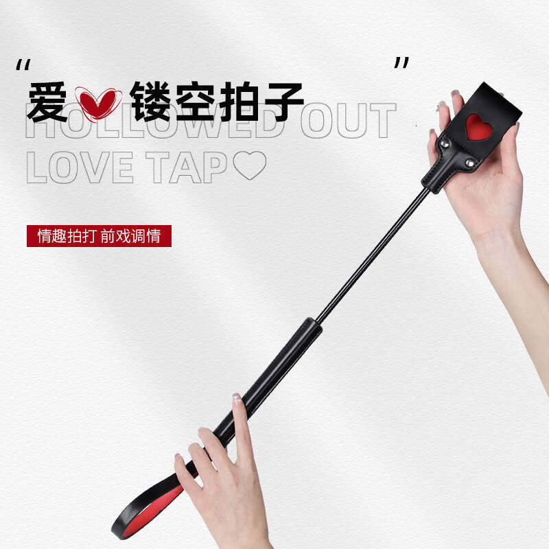 A hair replacement sex toy SM prop hollow heart sex racket SP long pole sex leather racket adult product