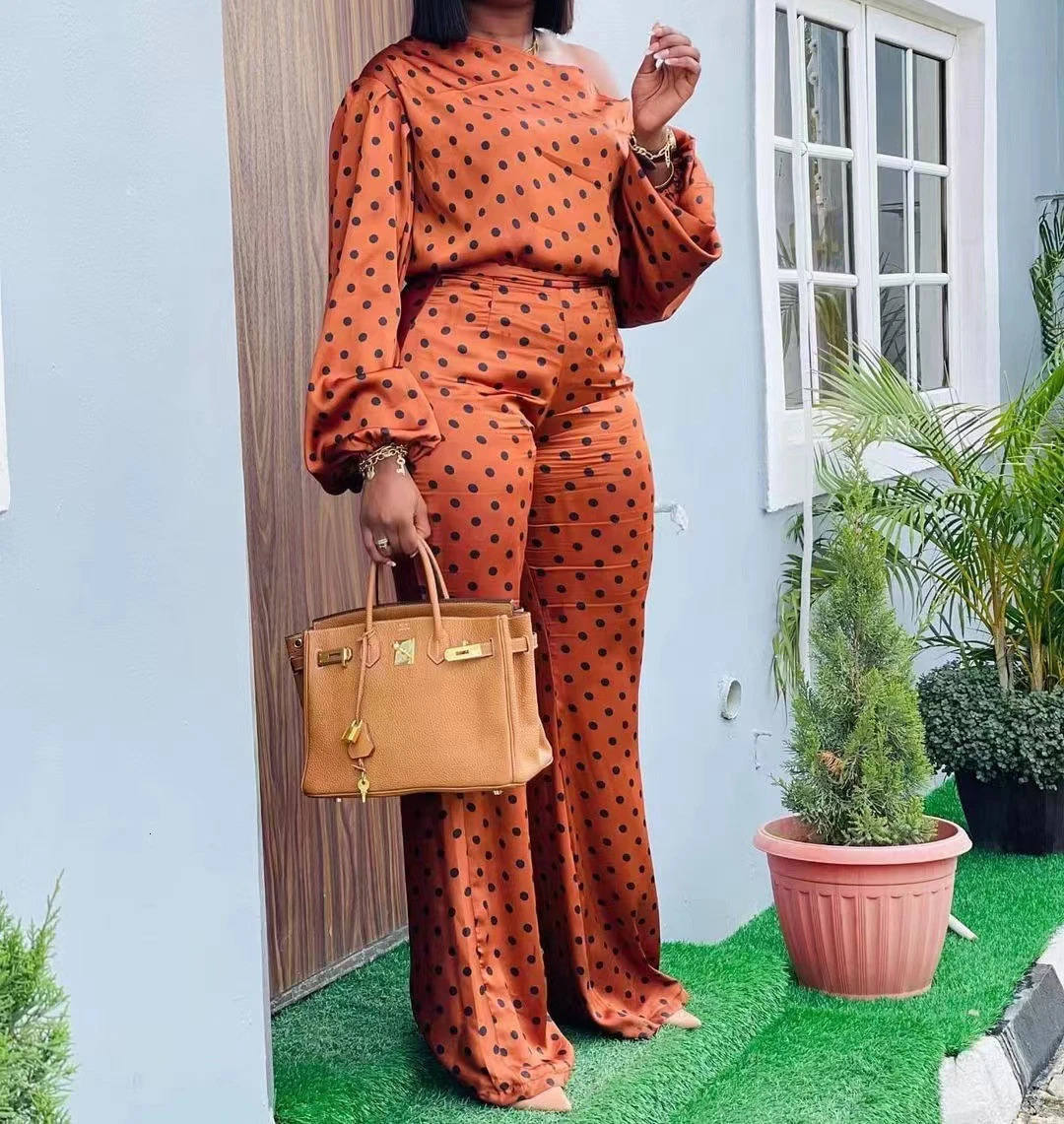 Two piece womens set wave dot printed long sleeved spiral neck top and fashionable loose pants casual for spring 241008