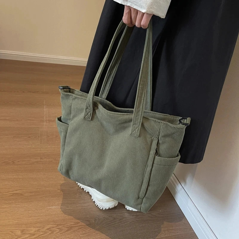 Solid color large capacity Commuting handbag simple style womens Corduroy shoulder bag fashionable striped velvet handbag 241008