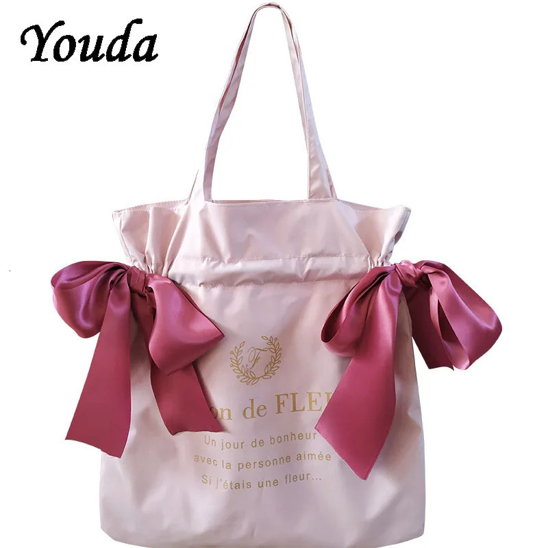 Womens canvas shoulder bag Korean version cute bow handbag student fashion large capacity reusable school shopping bag 241008