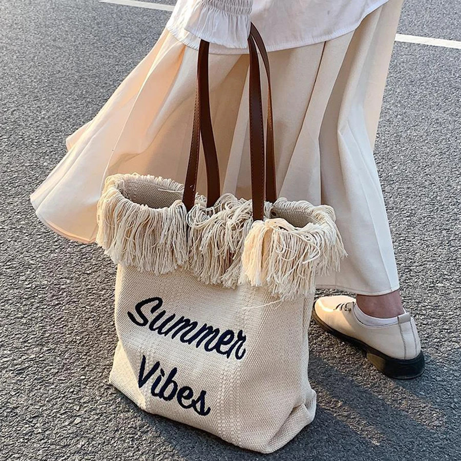 Fashionable large capacity letter embroidered edge canvas handbag portable commuting and shopping shoulder bag 241008