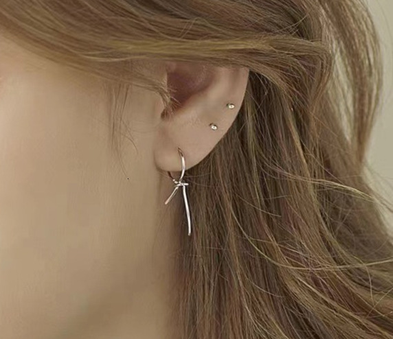 Pure sier needle knotted ribbon trendy women's ear accessories, simple and cool style earrings, earrings